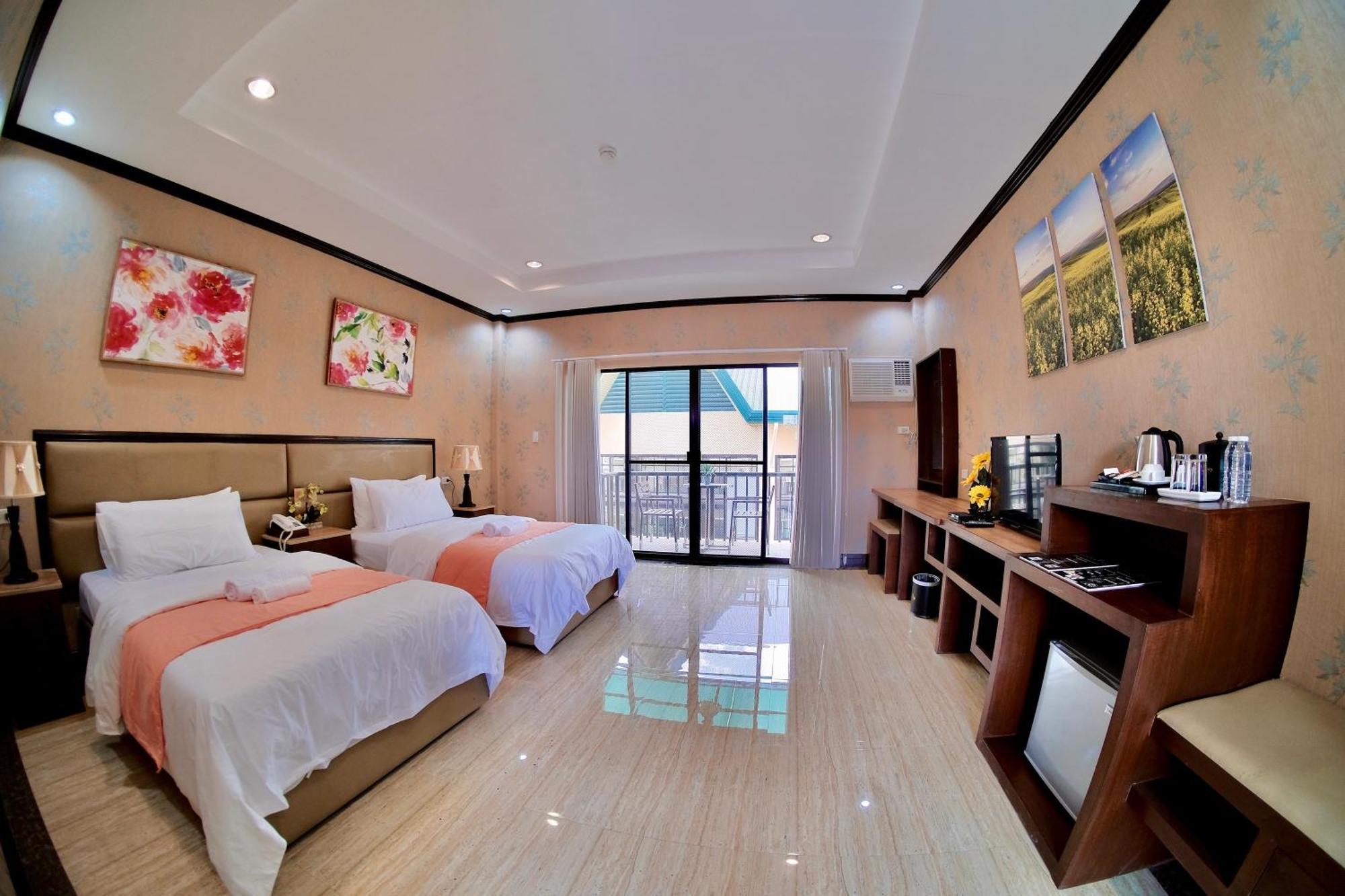 โรงแรมลุยซิตา เซ็นทรัล พาร์ค Tarlac City ห้อง รูปภาพ